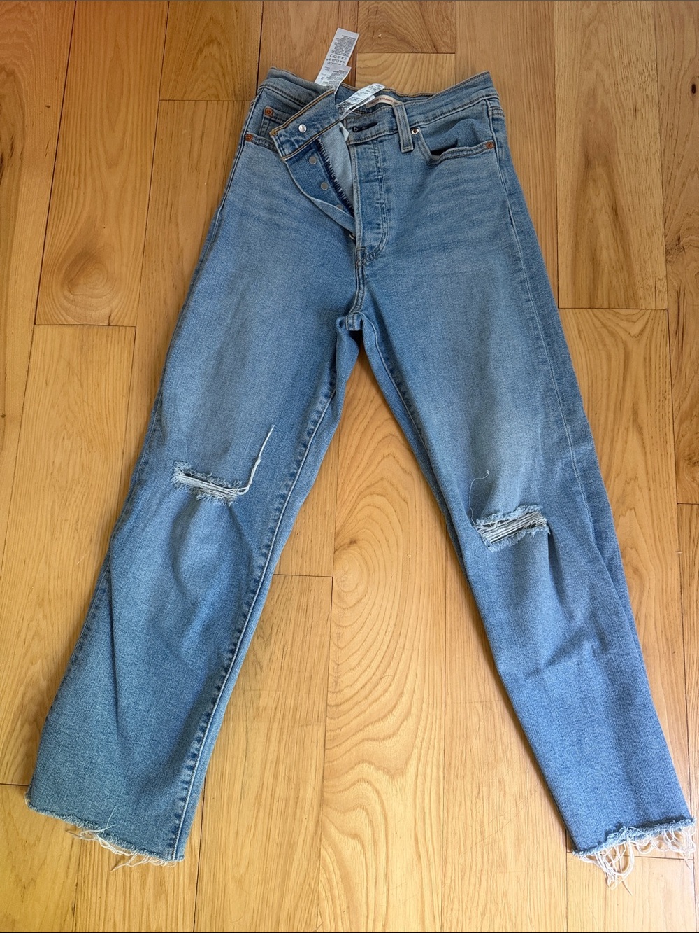 Levi’s Light Wash Distressed Ribcage Straight Ankle Jeans